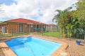 WIDE SIDE ACCESS TO LARGE SHED, SWIMMING POOL, 9 SOLAR PANEL SYSTEM, SEPERATE LIVING ROOM, OPEN PLAN FAMILY, DINING, KITCHEN, ENSUITE SHWR, CUL DE SAC