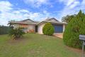 ADJACENT TO HERVEY BAY HOSPITAL ON THE EXCLUSIVE "HIGHFIELDS ESTATE"  LIVING, DINING AND SEPARATE FAMILY ROOM, SUPERB LARGE COVERED ENTERTAINMENT AREA