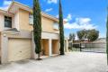 Trendy 3 bedroom townhouse in secure, gated community group.