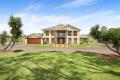 IF NOT ONE OF THE MOST DESIRABLE ACRE RESIDENCES IN TOWN !