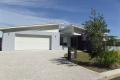 EXECUTIVE  PELICAN WATERS HOME WITH PRIVACY...