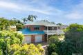 Elevated Brick Home with Ocean Views & Dual Living Potential