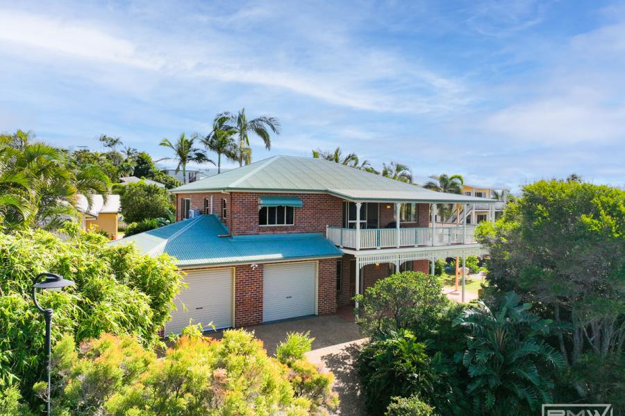 Elevated Brick Home with Ocean Views & Dual Living Potential