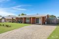 Solid Brick Home on 700m² – Side Access, Shed & Multiple Living Areas