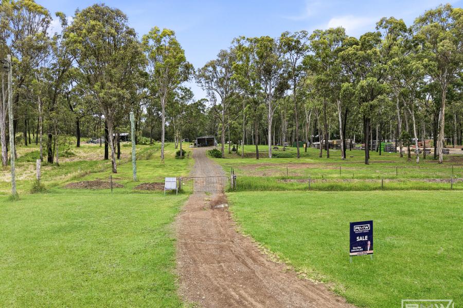 Acreage Freedom on Fully Fenced 5 Acres with Shed