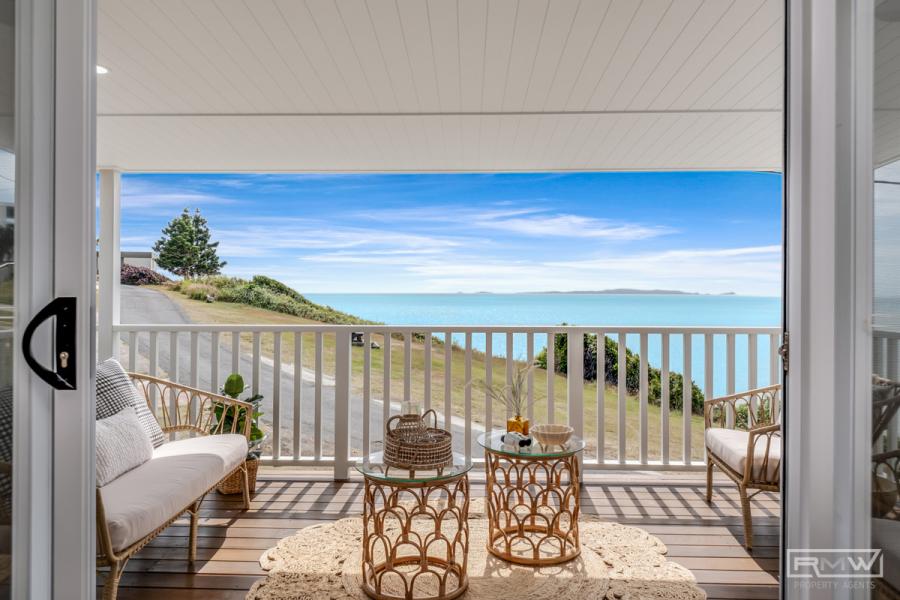 Stunning Brand New Coastal Home with Ocean Views in Cooee Bay