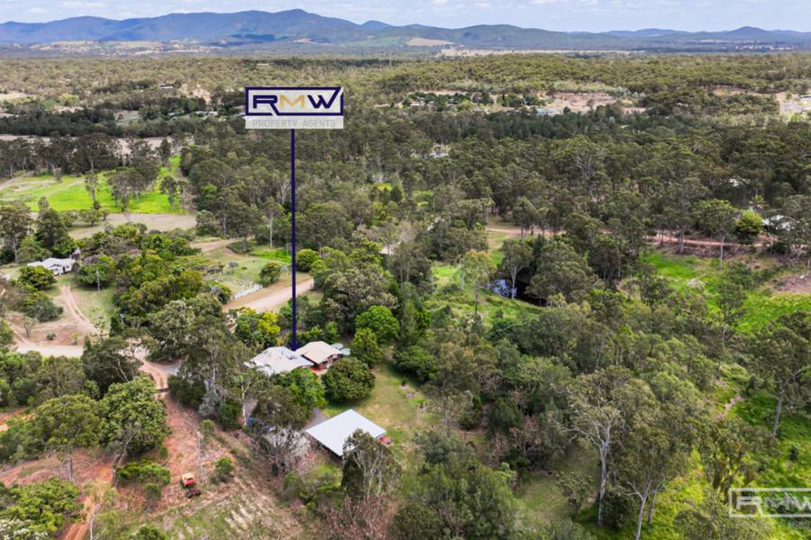 Peaceful Country Living on Expansive 5-Acre Property in Cawarral