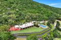 EXCLUSIVE AREAGE RESIDENCE OVERLOOKING YEPPOON TOWNSHIP