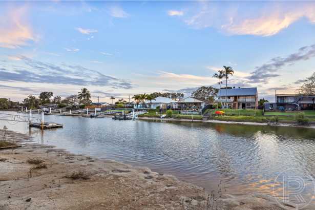 A stylishly updated duplex offering a relaxed, low-maintenance waterfront lifestyle.