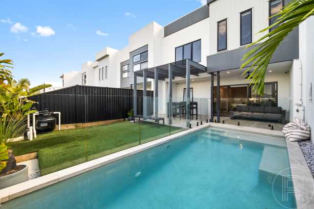 Where Luxury Meets Low Maintenance Living in the Heart of Harmony