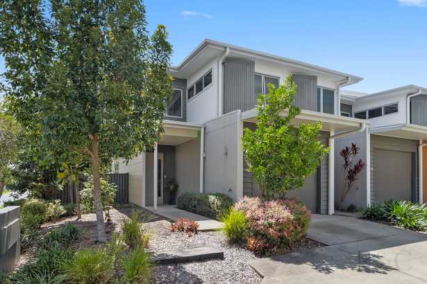 Stylish Coastal Living in a Premium Waterfront Precinct