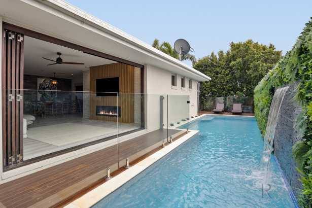 Designed around relaxed family living, with the pool at the center