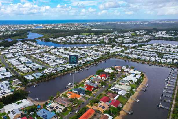 Deepwater canal-front home offering laid back living with development potential