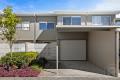 Stylish 3 bedroom, 2 car townhome with Private Courtyard