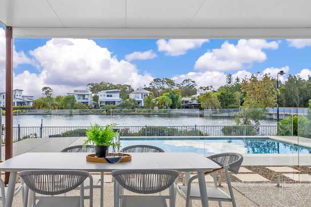 Waterfront Elegance – Expansive Double-Storey Family Home with Water Views, Pool & Space for All