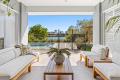 Stylish Single-Level Waterfront Living on 700m² with Pool