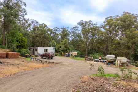 Private acreage retreat surrounded by serenity with so much potential.