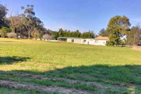 Land and 1950's plain older house. ***( under contract)