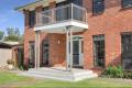 Prime location, 4 bedrooms plus study, golf course views, pool.