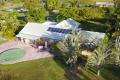 Two Quality Homes on 5 Acres of Tropical Serenity