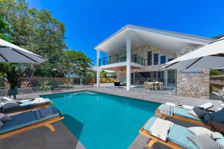 A Rare Coastal Retreat With Private Beach Access