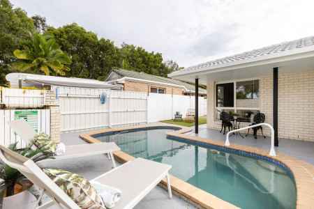 Coastal Sunshine Coast living near lake, surf, and everything you need