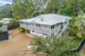 Idyllic home on half acre a stones throw from the beach.