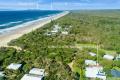 House in secluded unique seaside village on the Sunshine Coast. Your private getaway with beach only access.