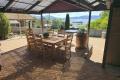 Fully furnished family home or rental property, in town with spectacular lake views.