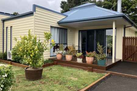 Delightful North facing renovated single level two bedroomed Townhouse