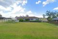 Renovator’s Dream – Solid Brick Home in Prime Warwick Location!