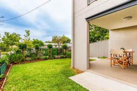 Rare ground floor unit with Private Garden!