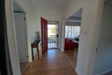 Unique Cottage with secure yard, relaxing sundrenched back deck and huge shed. Move in Ready!