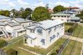 Immaculate Gabled Queenslander on an elevated 642m2 allotment.