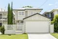 Stunning Custom Designed Family Home on a Quiet Elevated Street!