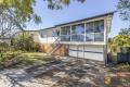 FAMILY HOME WITH HUGE STORAGE AREA!