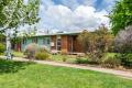 Charming 4-Bedroom Canberra Red Brick Home in Prime Location!
