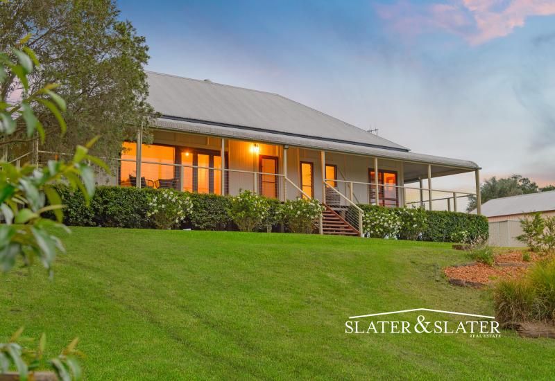 Heritage home with absolute river frontage and fertile acreage