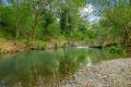 Nearly 8 acres with absolute river frontage on the edge of Beechwood