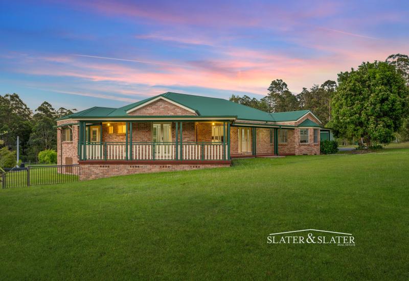 Expansive home on 4 level acres in quiet cul-de-sac