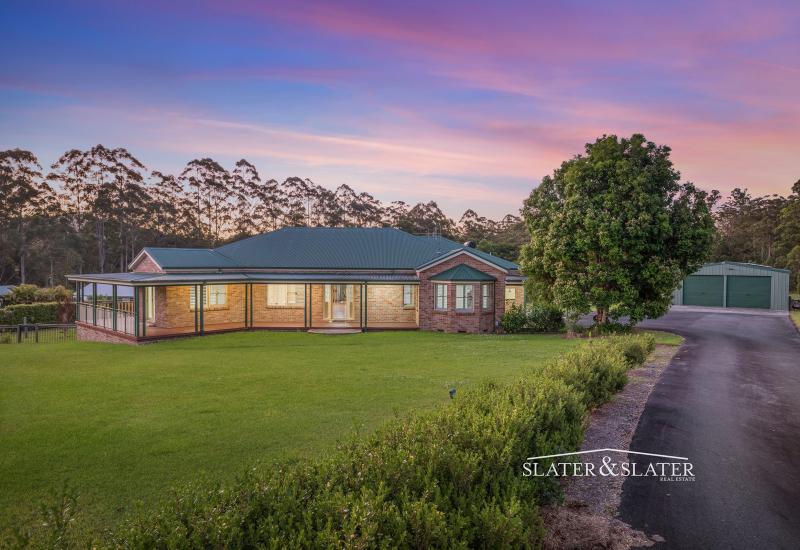 Expansive home on 4 level acres in quiet cul-de-sac