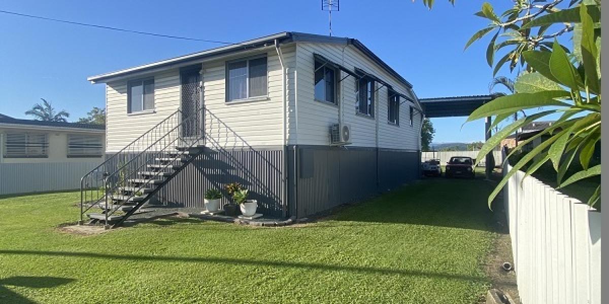 RENOVATED FOUR BEDROOM HIGH SET.