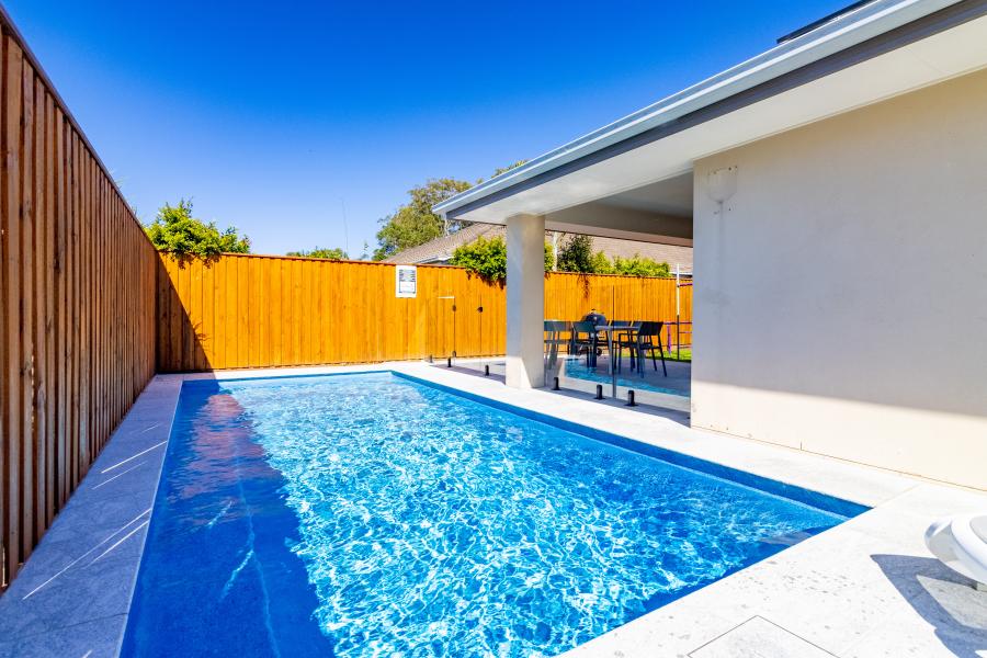 Dive into the Rental Market with This Stunning Family Oasis!