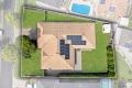 Peaceful Family Haven on a Large 736m² Block with Dual Side Access - Right in the Heart of Caloundra
