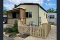 Cosy Cottage with fenced yard for small dog (over 50's complex)