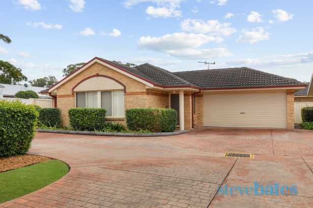 Modern, Low-Maintenance Living in a Boutique Complex of 9