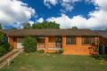 This perfectly positioned for convenience, brick and tile home offers a comfortable lifestyle just moments from essential amenities.
