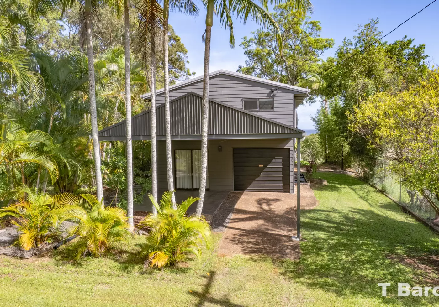 Home has double carport with garage