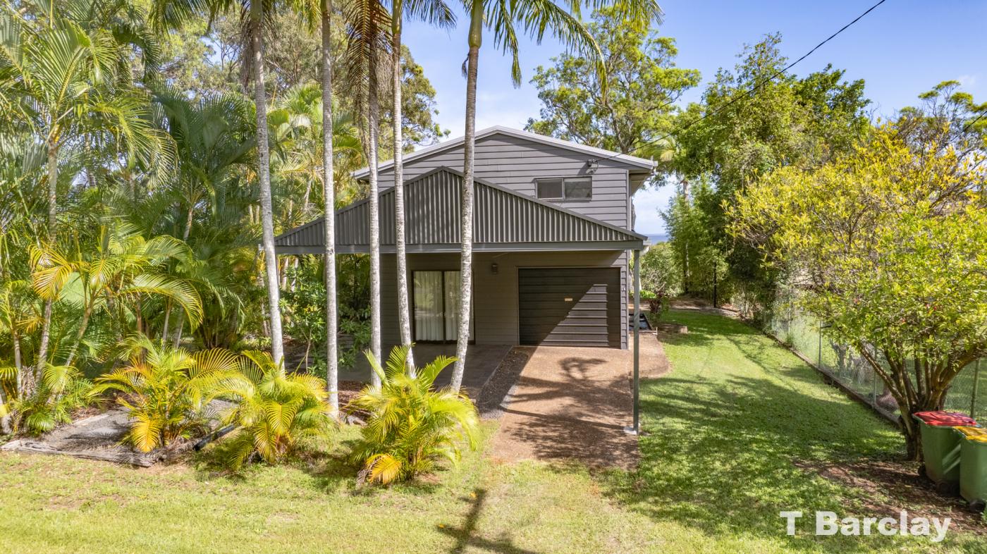 Home has double carport with garage