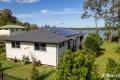 Waterfront Haven Overlooking Boat Moorings with Level Water Access